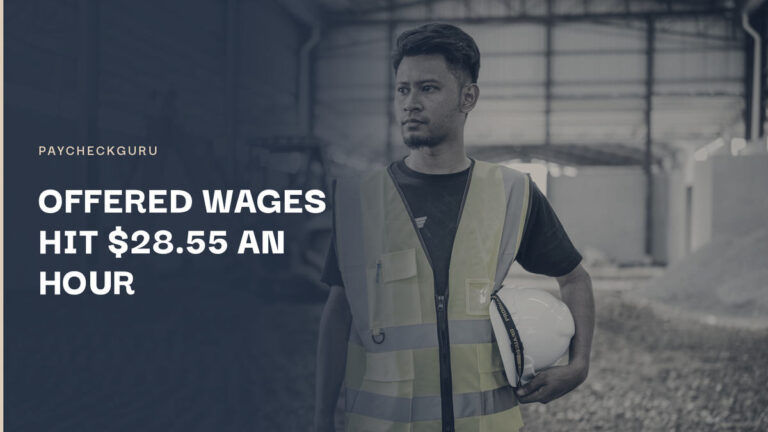 Construction worker in a high-visibility vest holding a hard hat at a job site, illustrating Canada's job vacancies and the $28.55 average offered hourly wage
