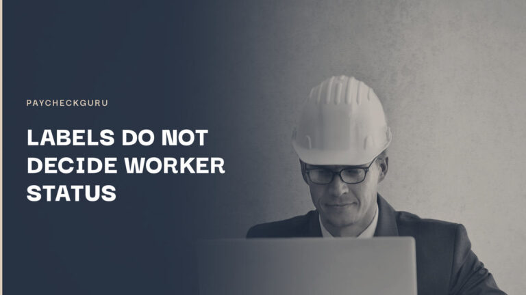 Engineer in a hard hat working at a laptop with technical drawings spread across the desk, illustrating an Ontario ruling on employee versus independent contractor status