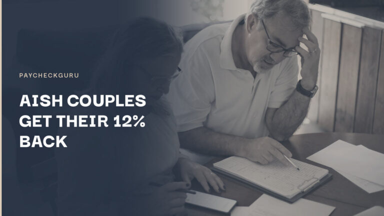 Older couple at a kitchen table, the man reviewing a statement on a clipboard while the woman checks her phone, illustrating Alberta restoring full AISH benefits for couples